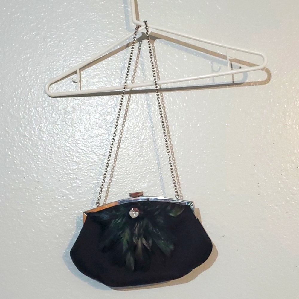 Jessica McClintock special occasion black purse.